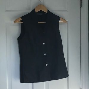 Banana Republic black silk sleeveless button up. Size small.